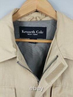 NWOT Kenneth Cole Canvas Coat Mens Size Large Tan Field Jacket translates to 'Manteau en toile Kenneth Cole pour homme, taille L, couleur kaki, style veste de terrain, jamais porté.'