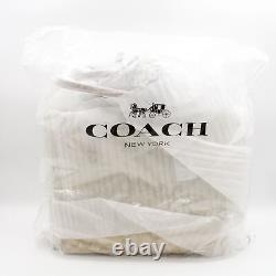 Sac fourre-tout Coach Signature en toile enduite avec poignée supérieure en kaki clair/selle clair